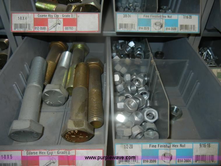 image for item T9516 (10) rows of assorted Grade 8 bolts, screws, nuts, and washers