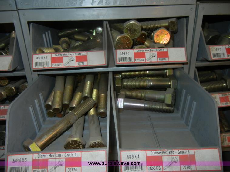 image for item T9516 (10) rows of assorted Grade 8 bolts, screws, nuts, and washers