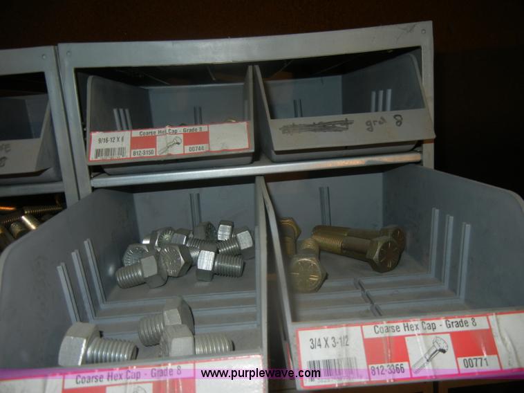 image for item T9516 (10) rows of assorted Grade 8 bolts, screws, nuts, and washers