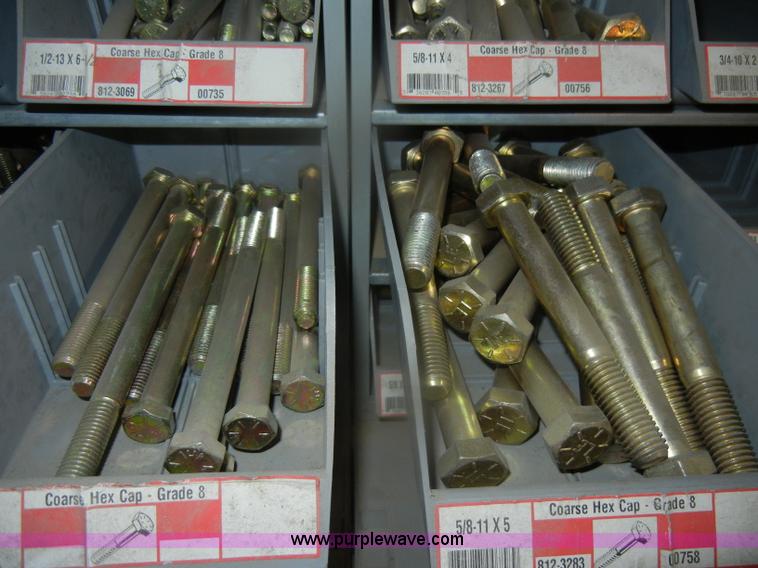 image for item T9516 (10) rows of assorted Grade 8 bolts, screws, nuts, and washers