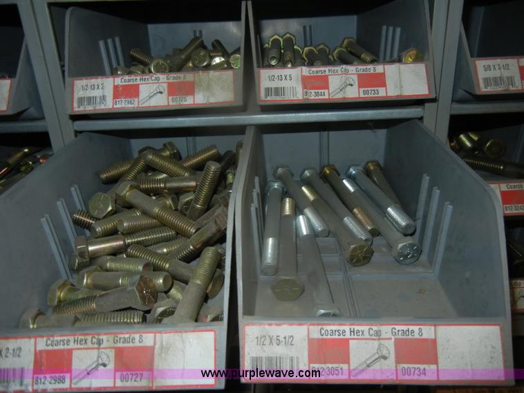 image for item T9516 (10) rows of assorted Grade 8 bolts, screws, nuts, and washers