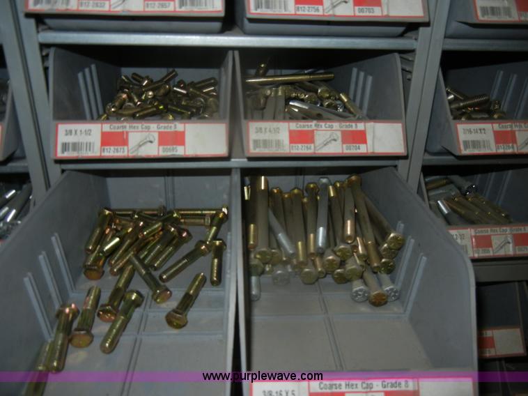 image for item T9516 (10) rows of assorted Grade 8 bolts, screws, nuts, and washers