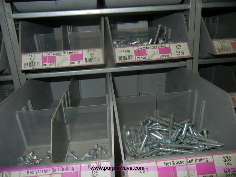 image for item T9516 (10) rows of assorted Grade 8 bolts, screws, nuts, and washers