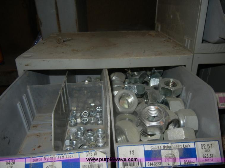image for item T9516 (10) rows of assorted Grade 8 bolts, screws, nuts, and washers