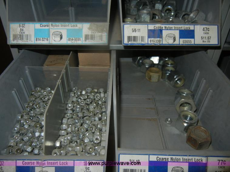 image for item T9516 (10) rows of assorted Grade 8 bolts, screws, nuts, and washers