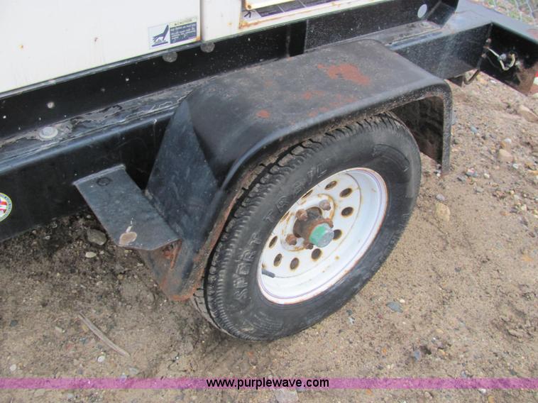 image for item E2527 2006 Multiquip Whisper Watt 25 generator