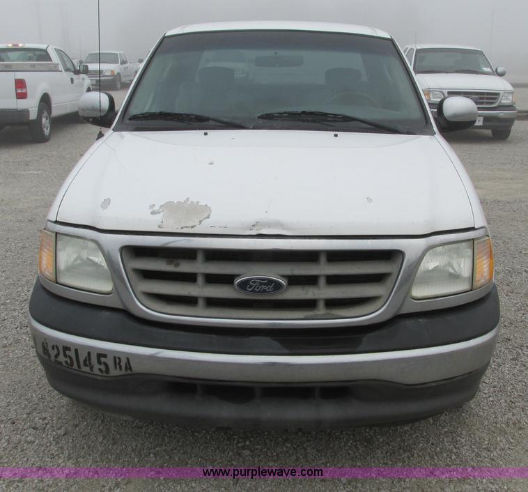 image for item F4054 2002 Ford F150 XLT SuperCab pickup truck