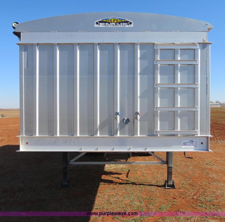 image for item B4531 2013 Farris GH1028 28.5' aluminum double hopper grain trailer