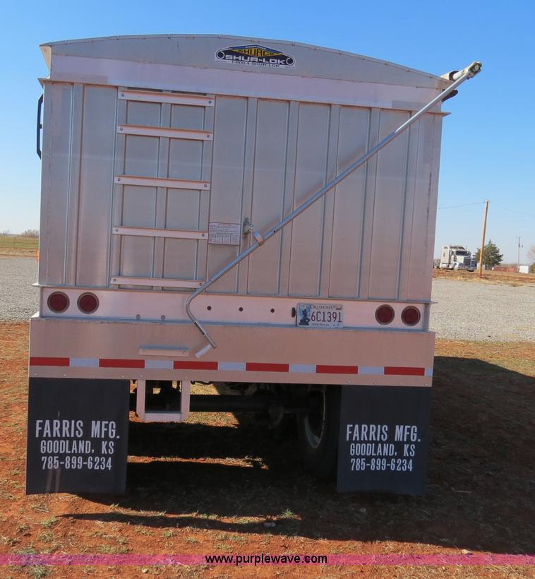 image for item B4531 2013 Farris GH1028 28.5' aluminum double hopper grain trailer