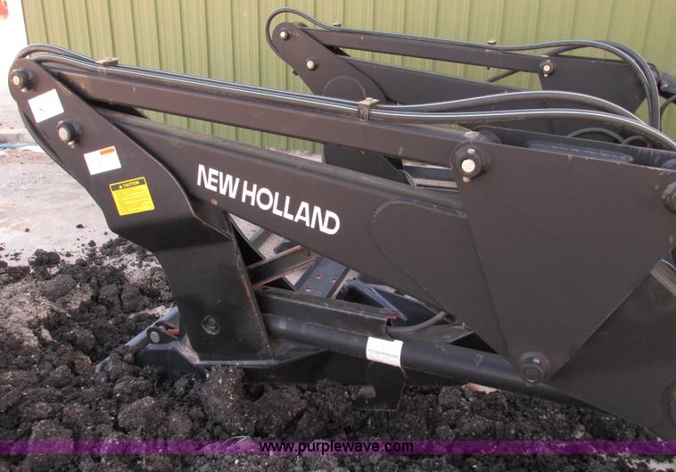 image for item E3565 New Holland 7614 loader