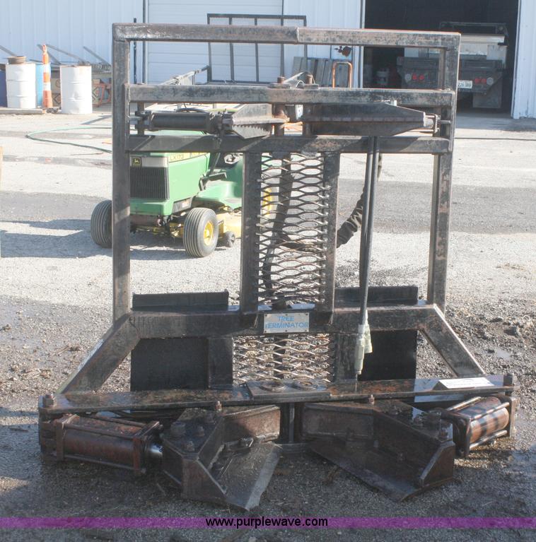 image for item F2764 Tree Terminator tree shear skid steer attachment