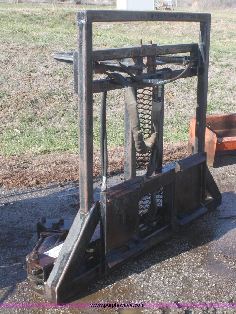 image for item F2764 Tree Terminator tree shear skid steer attachment