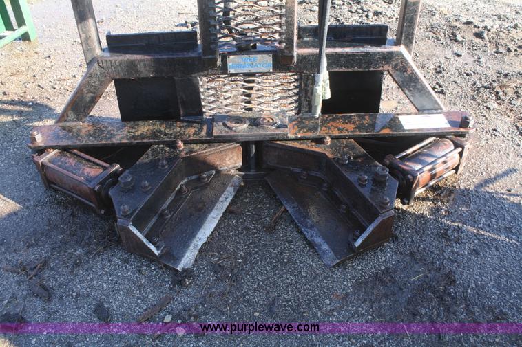 image for item F2764 Tree Terminator tree shear skid steer attachment