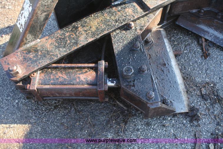 image for item F2764 Tree Terminator tree shear skid steer attachment