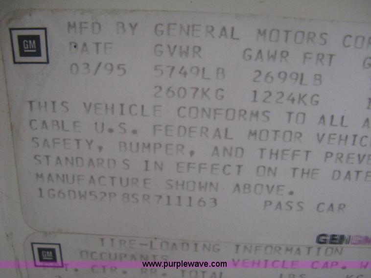 image for item B8228 1995 Cadillac Fleetwood Federal Coach limousine