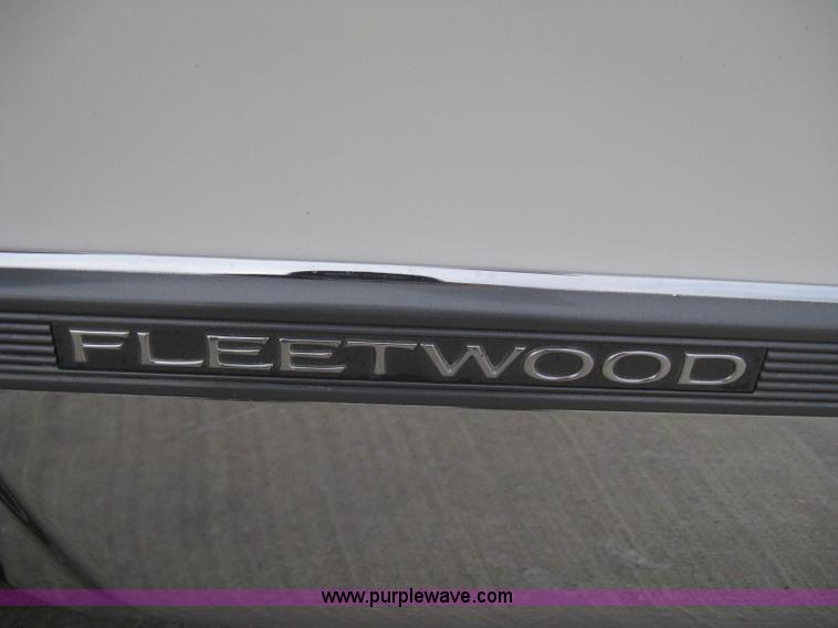 image for item B8228 1995 Cadillac Fleetwood Federal Coach limousine