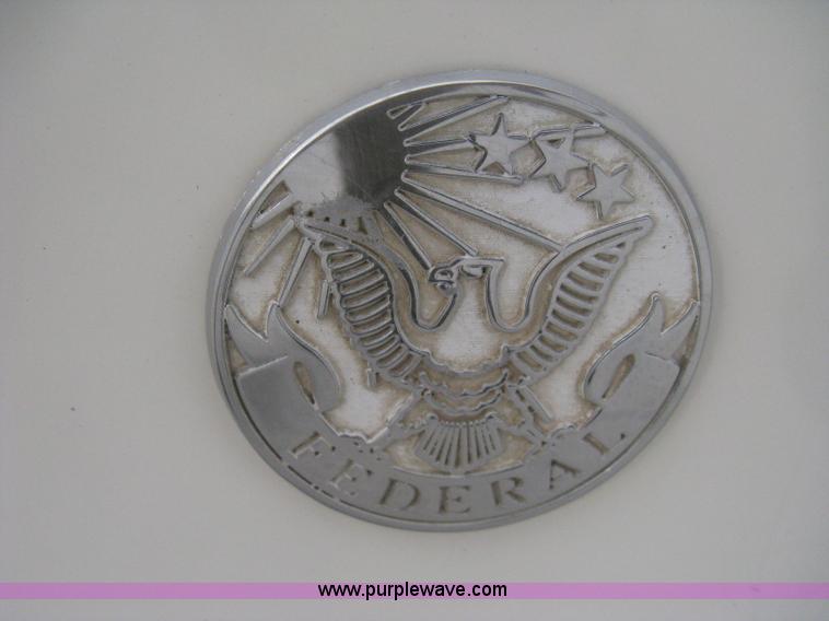 image for item B8228 1995 Cadillac Fleetwood Federal Coach limousine