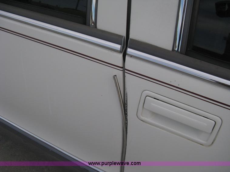 image for item B8228 1995 Cadillac Fleetwood Federal Coach limousine