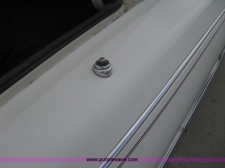 image for item B8228 1995 Cadillac Fleetwood Federal Coach limousine