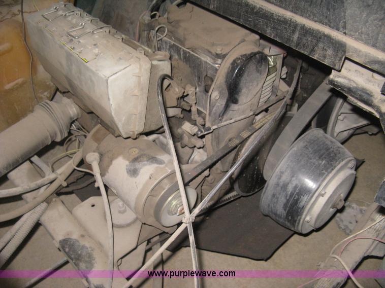 image for item B8238 E-Z-Go Work Horse 1200LX golf cart