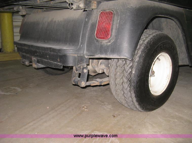 image for item B8238 E-Z-Go Work Horse 1200LX golf cart