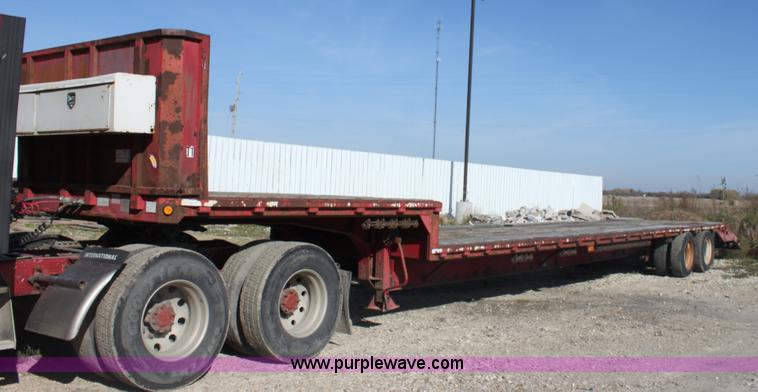 image for item E4225 1995 Daco dual tandem axle flatbed trailer