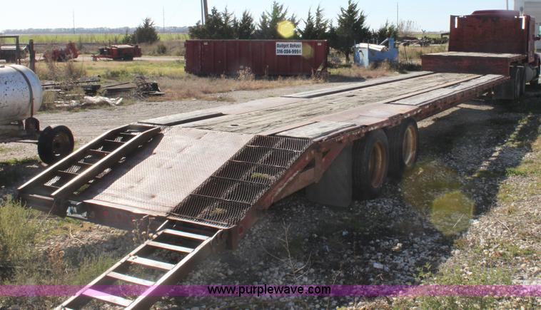 image for item E4225 1995 Daco dual tandem axle flatbed trailer