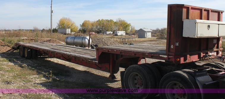 image for item E4225 1995 Daco dual tandem axle flatbed trailer