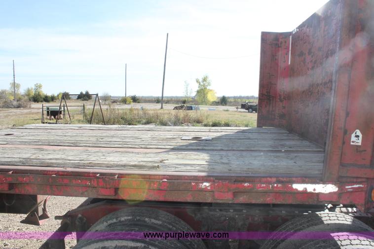image for item E4225 1995 Daco dual tandem axle flatbed trailer