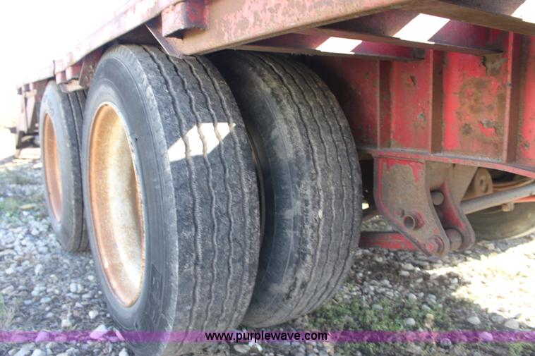 image for item E4225 1995 Daco dual tandem axle flatbed trailer