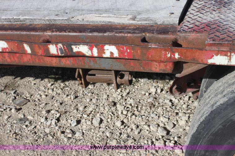 image for item E4225 1995 Daco dual tandem axle flatbed trailer