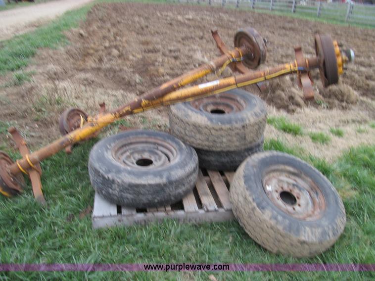 image for item O9051 (2) 7,500 lbs trailer axles with wheels and tires
