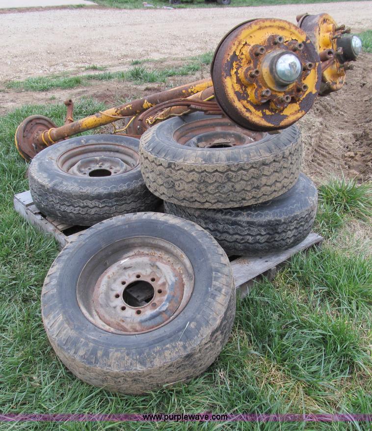 image for item O9051 (2) 7,500 lbs trailer axles with wheels and tires