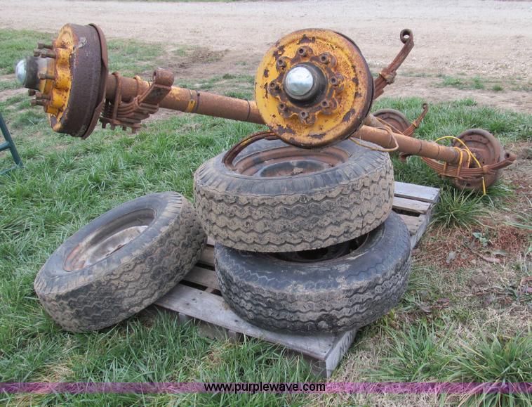 image for item O9051 (2) 7,500 lbs trailer axles with wheels and tires