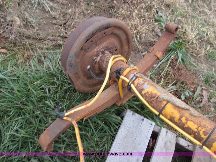 image for item O9051 (2) 7,500 lbs trailer axles with wheels and tires