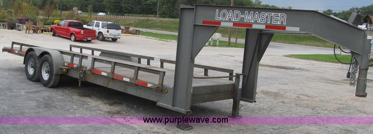 image for item B2889 2008 Loadmaster 24' drop deck gooseneck trailer