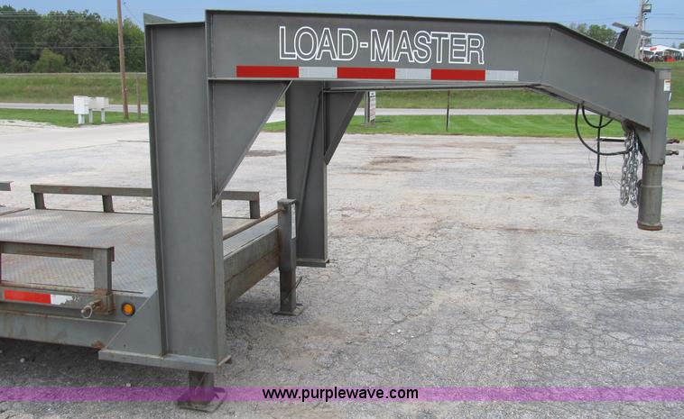image for item B2889 2008 Loadmaster 24' drop deck gooseneck trailer