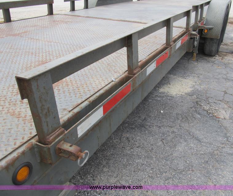 image for item B2889 2008 Loadmaster 24' drop deck gooseneck trailer