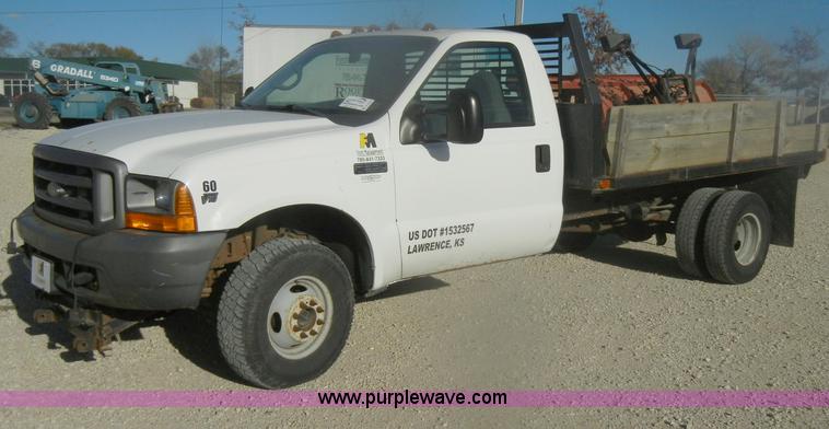 image for item D4714 2000 Ford F350 XL Super Duty flatbed pickup truck