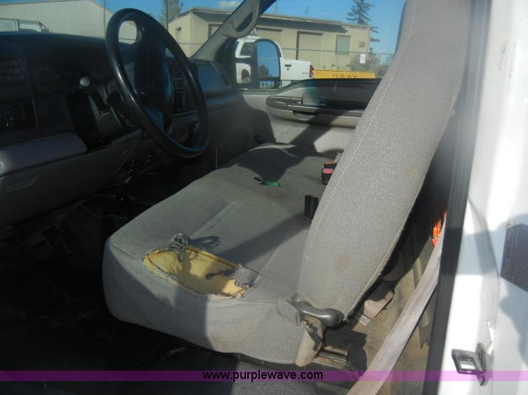 image for item D4714 2000 Ford F350 XL Super Duty flatbed pickup truck