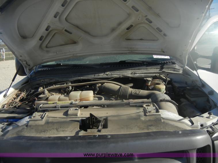 image for item D4714 2000 Ford F350 XL Super Duty flatbed pickup truck