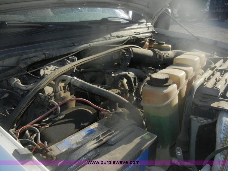 image for item D4714 2000 Ford F350 XL Super Duty flatbed pickup truck