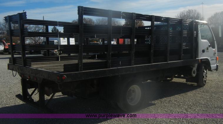 image for item D4720 2002 GMC W3500 flatbed truck