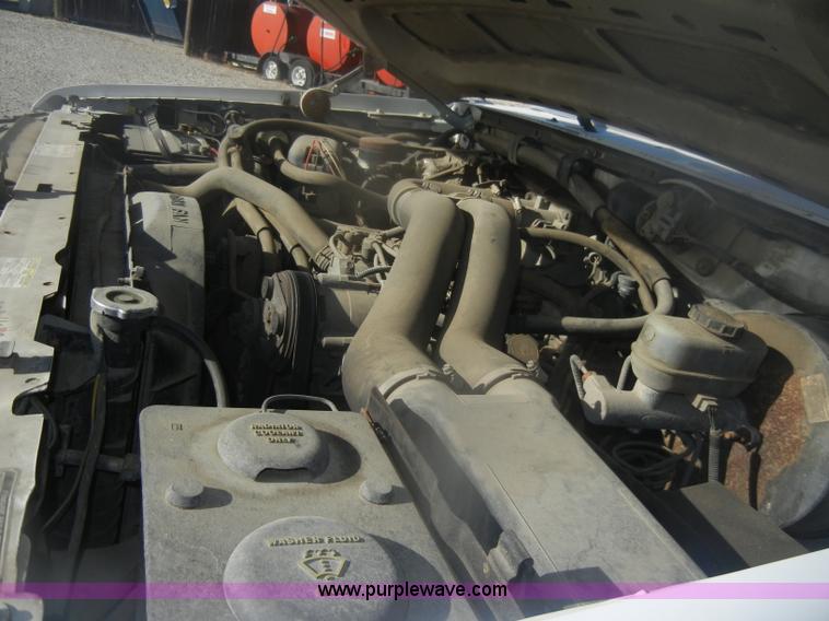 image for item D4721 1997 Ford F350 XL flatbed pickup truck