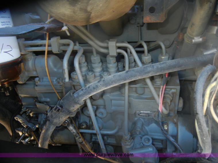 image for item D4723 1991 Ford FT900F water truck