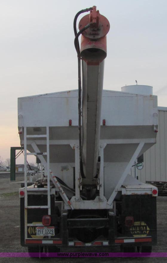 image for item E2503 1999 Freightliner FL70 fertilizer tender truck