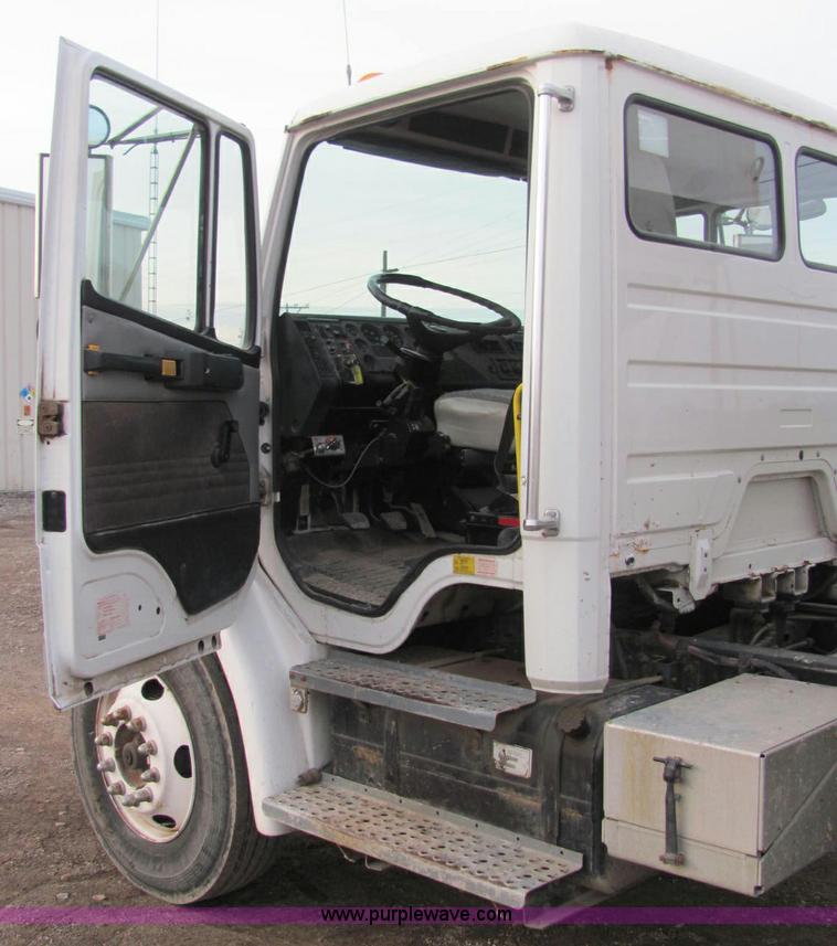 image for item E2503 1999 Freightliner FL70 fertilizer tender truck