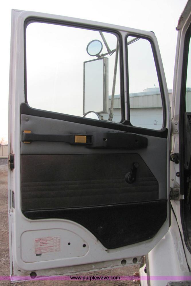 image for item E2503 1999 Freightliner FL70 fertilizer tender truck