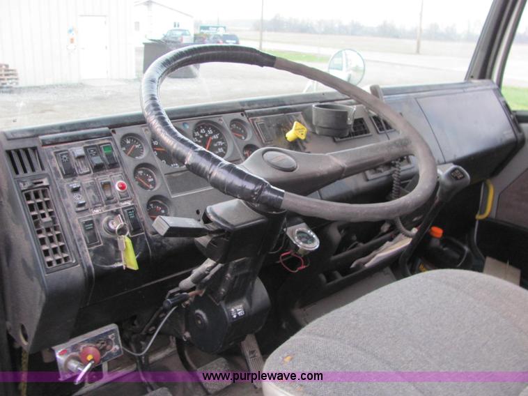 image for item E2503 1999 Freightliner FL70 fertilizer tender truck