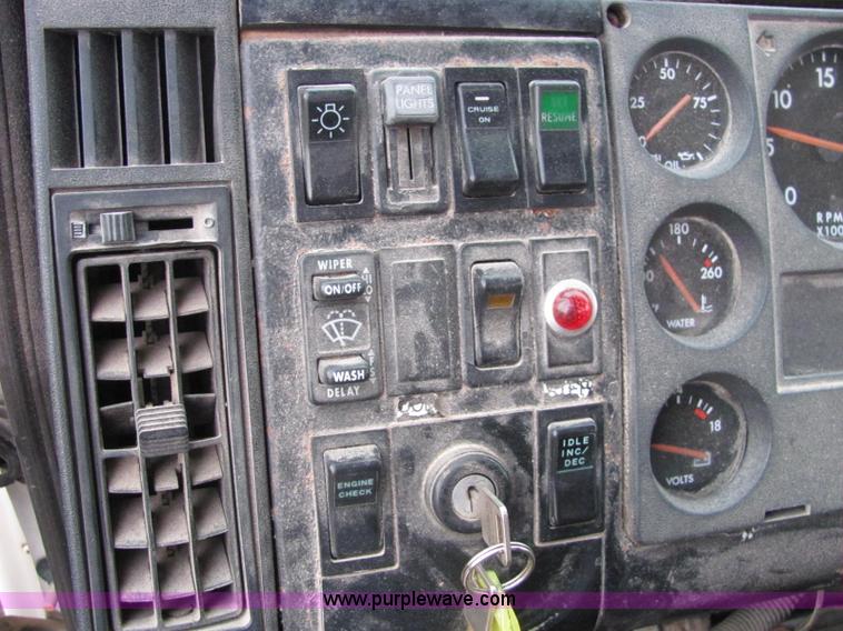 image for item E2503 1999 Freightliner FL70 fertilizer tender truck